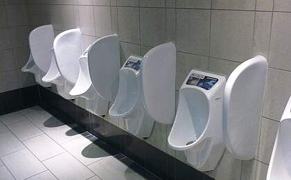Shopping center with URIMAT waterless urinals